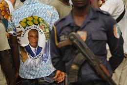 Armed supporters of Laurent Gbagbo - AP Armed supporters of Laurent Gbagbo - AP