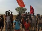 Lou Nuer cattle camp youth strike a pose for the camera in Uror country, Jonglei state